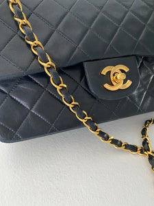 Authentic Pre-Loved Chanel Black Small 9” Lambskin Flap with gold Hardware