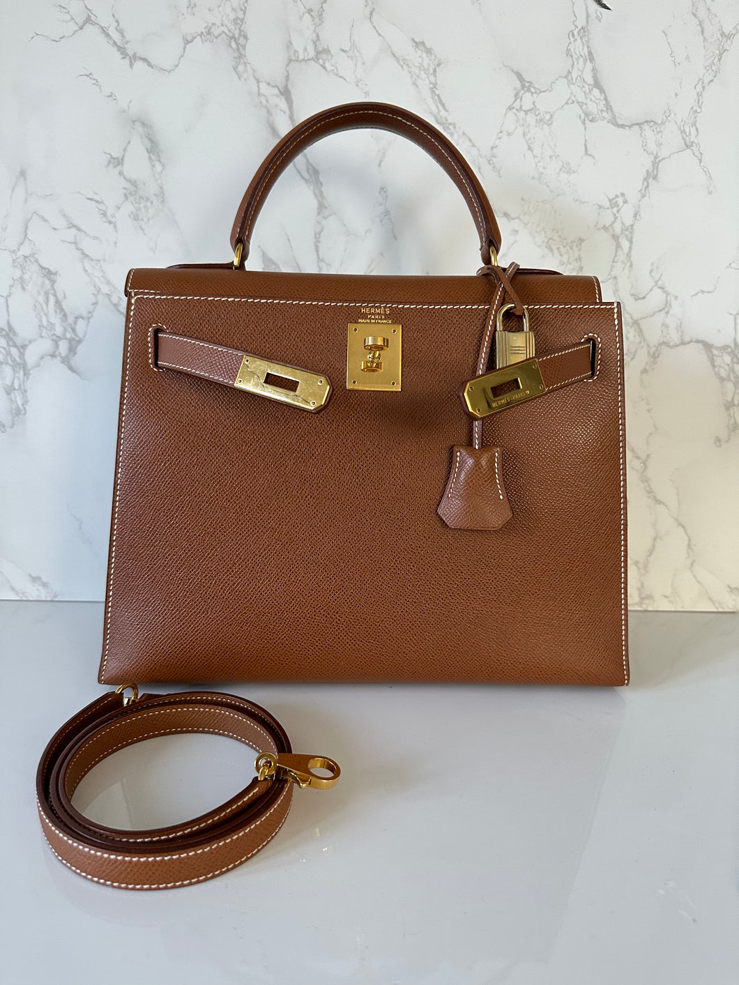 Authentic preowned Hermes Kelly 28 gold courchevel/epsom