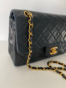 Authentic Pre-Loved Chanel Black Small 9” Lambskin Flap with gold Hardware