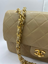 Load image into Gallery viewer, Authentic Chanel preloved Vintage Medium beige Flap with Gold Hardware